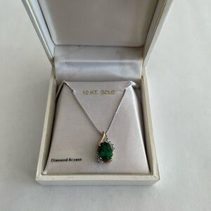 Duet sterling silver, 10 kt yellow gold oval created emerald and diamond pendant
